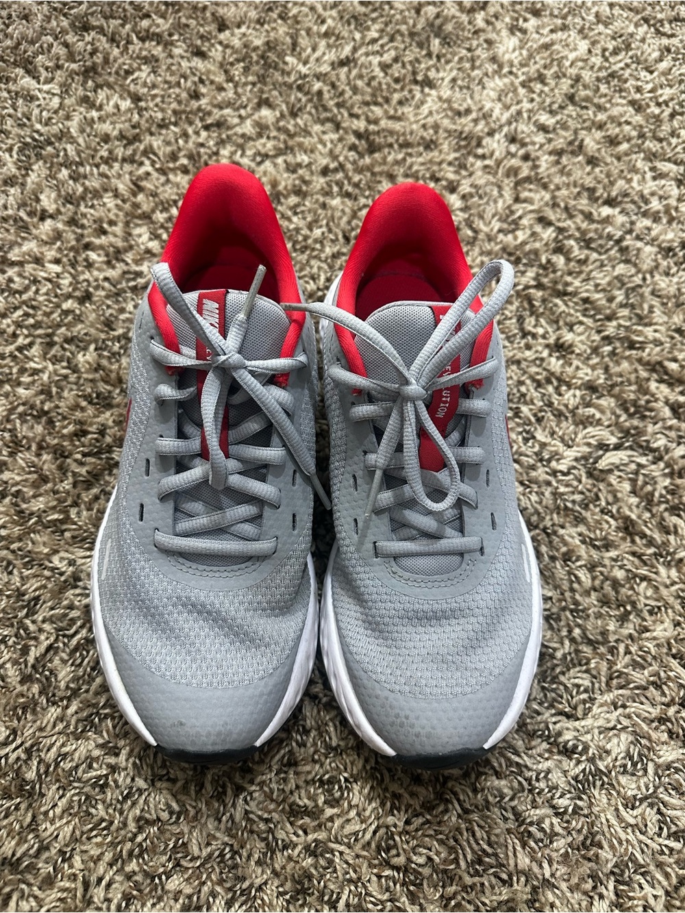 Nike Women’s Gray Athletic Shoes with Red Interior